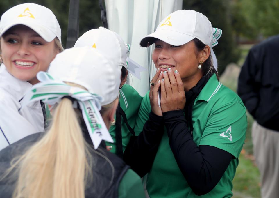 Dublin Jerome's Audrey Ryu reacts as she learns from her teammates that she has won the individual title at the Division I state tournament Oct. 23 at Ohio State's Gray Course.