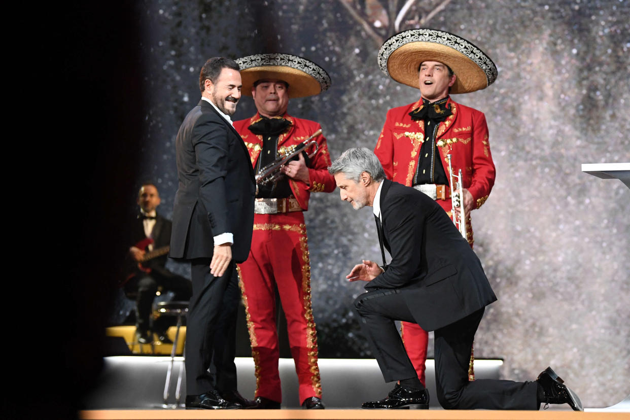 French actor Jose Garcia (L) and French TV and radio host and Master of Ceremony Antoine de Caunes perfom on stage during the 47th edition of the Cesar Film Awards ceremony at the Olympia venue in Paris on February 25, 2022. (Photo by Bertrand GUAY / AFP)