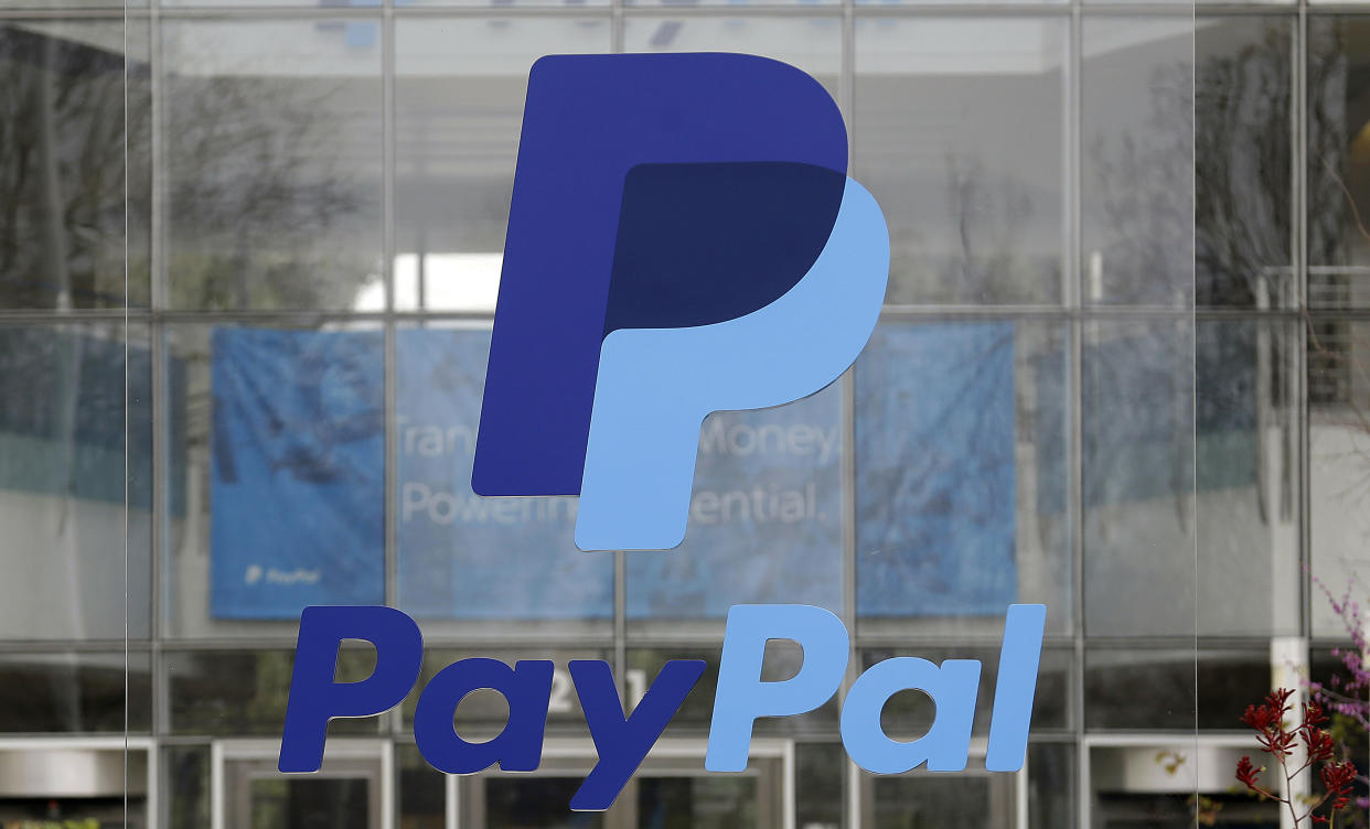 The PayPal logo hangs displayed outside their company headquarters.
