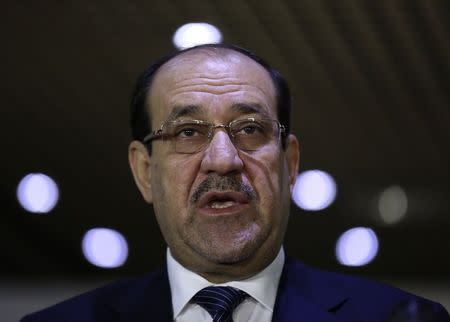 Iraqi Prime Minister Nuri al-Maliki speaks during a news conference after a meeting with speaker of parliament Salim al-Jabouri in Baghdad July 26, 2014. REUTERS/Stringer