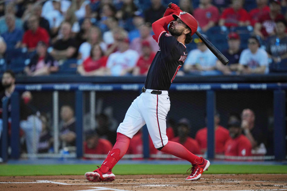 Washington Nationals designated hitter Jesse Winker (6) hits a single to left field in the first inning against the St. Louis Cardinals at CACTI Park of the Palm Beaches during spring training.
