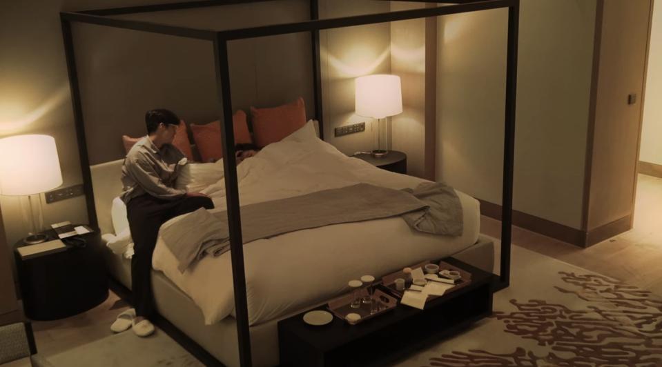 Yoong-jae touches Seo-eun's head as she falls asleep in bed
