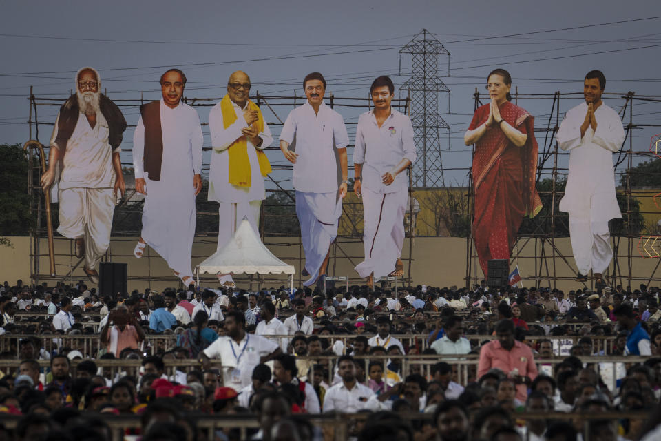 Large cutout portraits of Dravida Munnetra Kazhagam (DMK) and Indian National Congress (INC) leaders are erected overseeing political supporters during an election campaign rally ahead of country's general elections, on the outskirts of southern Indian city of Chennai, April 15, 2024. (AP Photo/Altaf Qadri)