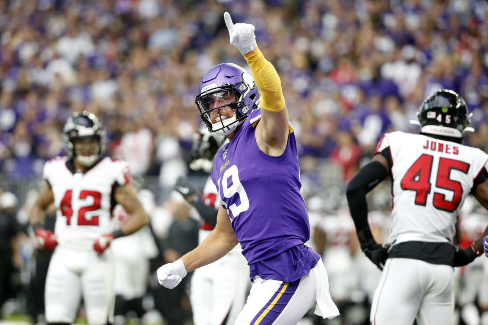 FILE - Minnesota Vikings wide receiver Adam Thielen celebrates after catching a 23-yard touchdown pass during the first half of an NFL football game against the Atlanta Falcons, Sunday, Sept. 8, 2019, in Minneapolis. The coronavirus pandemic scuttled most college pro days, wiped out all rookie minicamps and obliterated the NFL's traditional offseason. "Honestly, I probably wouldn't be in the NFL if this would've happened my rookie year," said Vikings two-time Pro Bowl receiver Adam Thielen, who went undrafted in 2013 out of Minnesota State but parlayed an impressive weekend at a rookie minicamp into a practice squad job and eventually a roster spot.(AP Photo/Bruce Kluckhohn, File)