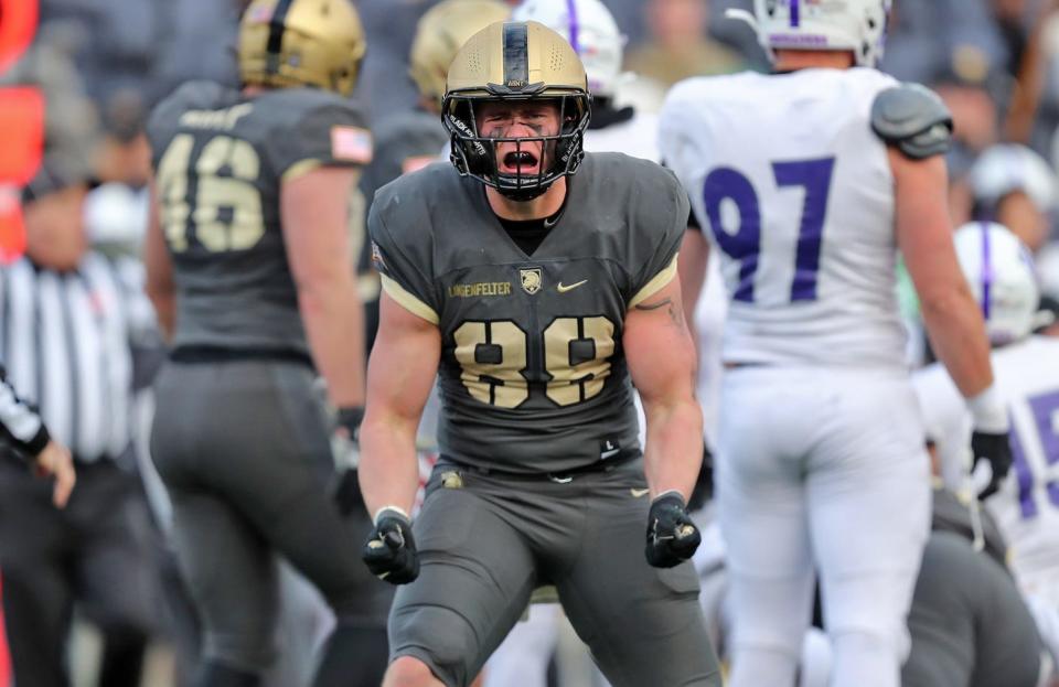 Army tight end Joshua Lingenfelter (88) celebrates a first down that clinched a 17-14 win against Holy Cross during the second half at Michie Stadium. Danny Wild-USA TODAY Sports