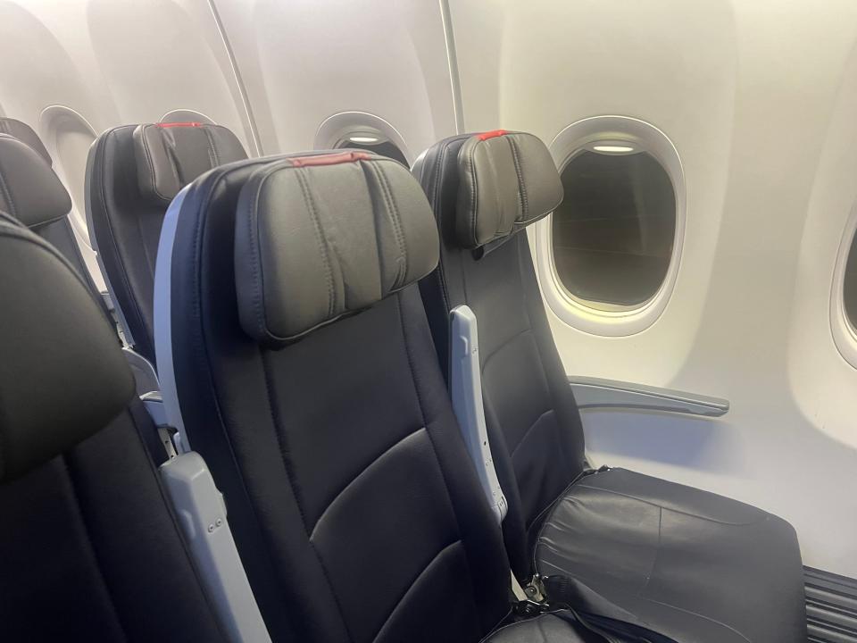 Inside American's 737-800 with headrests.