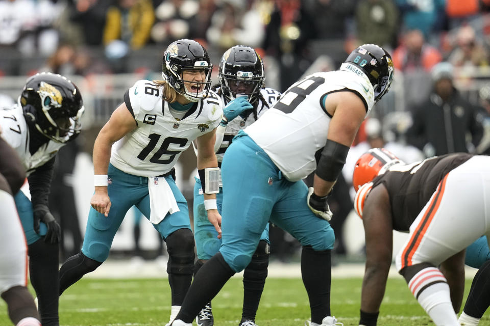 Jacksonville Jaguars quarterback Trevor Lawrence (16) yells out a count during the first half of an NFL football game against the Cleveland Browns, Sunday, Dec. 10, 2023, in Cleveland. (AP Photo/Sue Ogrocki)