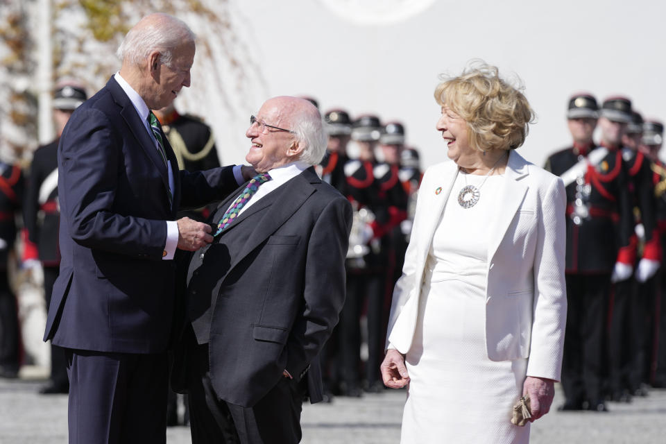 President Joe Biden talks with Irish President Michael Higgins and his wife Sabina at Aras an Uachtarain, Thursday, April 13, 2023, in Dublin. (AP Photo/Patrick Semansky)
