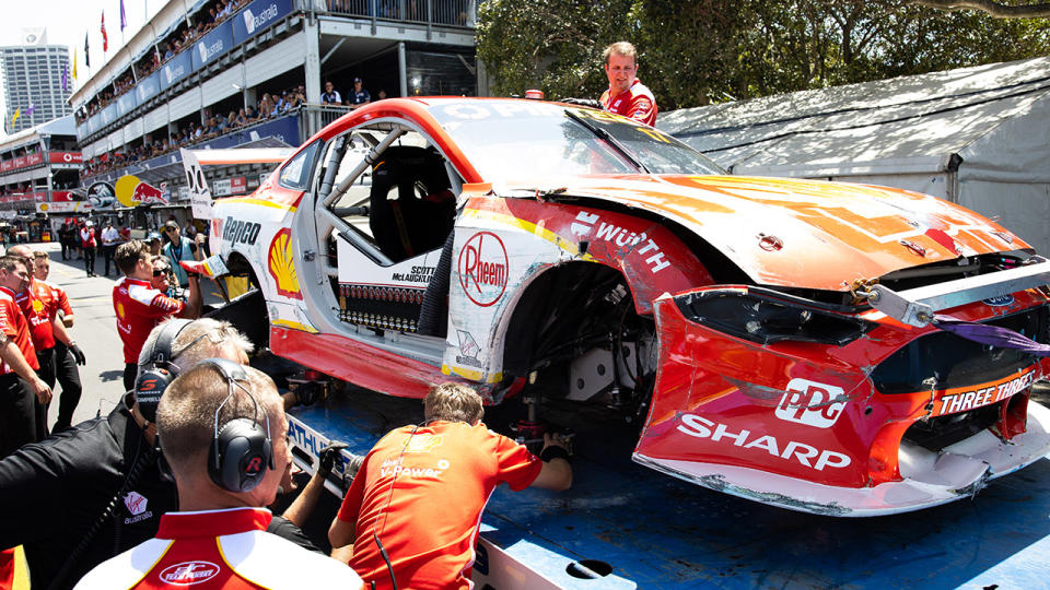 Scott McLaughlin's car, pictured here being taken away after the crash.