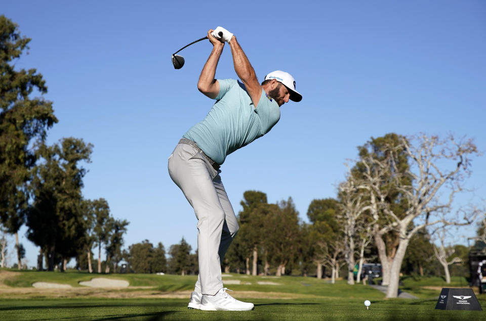 Dustin Johnson tees off on the 17th hole during the second round of the Genesis Invitational golf tournament at Riviera Country Club, Friday, Feb. 19, 2021, in the Pacific Palisades area of Los Angeles. (AP Photo/Ryan Kang)