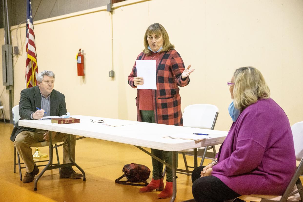Dianne Barghouti Hardwick, center, chairwoman of the Sangamon County Republican Party, goes through the formal process of picking Sandy Hamilton as the replacement for the Illinois 99th District House seat during a ceremony at the Gardner Township Town Hall in Springfield, Ill., Thursday, December 30, 2021. Hamilton replaces Mike Murphy who resigned from his the seat on Nov. 30. [Justin L. Fowler/The State Journal-Register] 