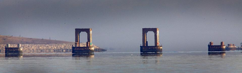 The piers of the former Long Island Bridge in Quincy Bay on Tuesday, Dec. 11, 2018.