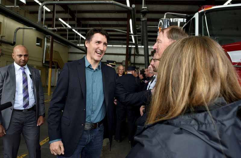 FILE PHOTO: Canada’s Prime Minister Justin Trudeau speaks with firefighters, in Hammonds Plains