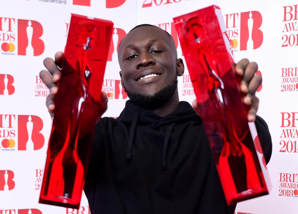 Stormzy with his British Album of the Year and British Male Solo Artist awards in the press room during the Brit Award. (PA)
