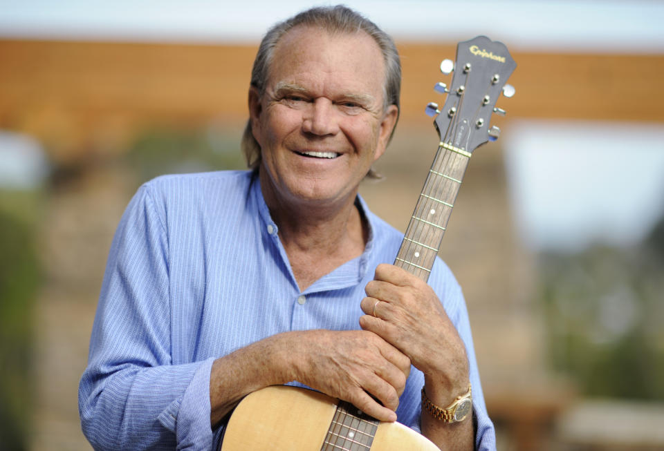 <p>The musician was known for such songs as “By the Time I Get to Phoenix” and “Rhinestone Cowboy.” He died Aug. 8 at age 81. (Photo: Phil McCarten/Reuters) </p>