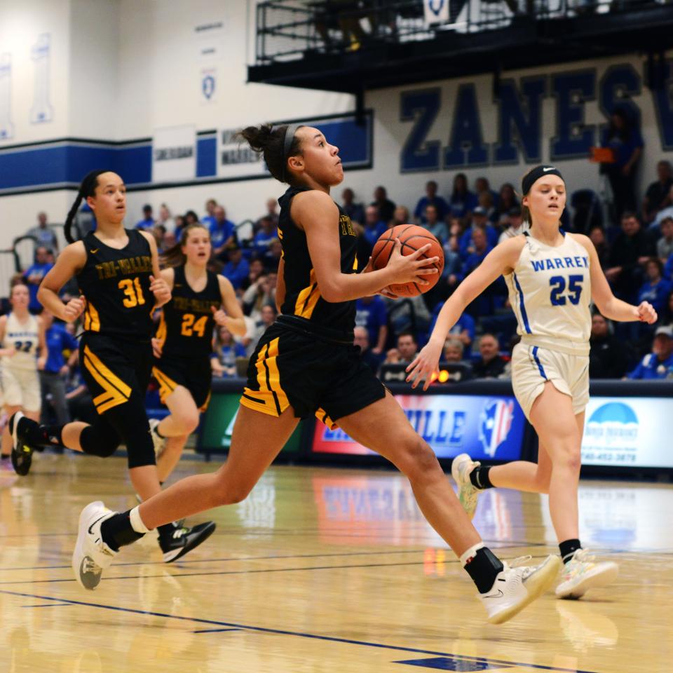 Lexi Howe drives in for a layup during Tri-Valley's loss to Vincent Warren in last year's regional semifinal. Howe, one of the area's top players, will be the main force for the Scotties, who add some talented underclassmen to the roster.
