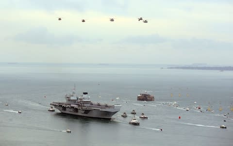 HMS Queen Elizabeth flypast - Credit: Gareth Fuller/PA