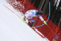 Switzerland's Mauro Caviezel competes during an alpine ski, men's World Cup combined, in Hinterstoder, Austria, Sunday, March 1, 2020. (AP Photo/Marco Trovati)