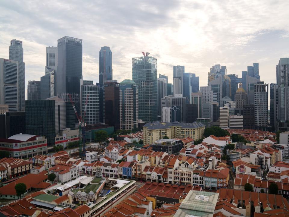 Shophouses and skyscrapers in the central business district of Singapore, on Sunday, Oct. 3, 2021. Photographer: Ore Huiying/Bloomberg