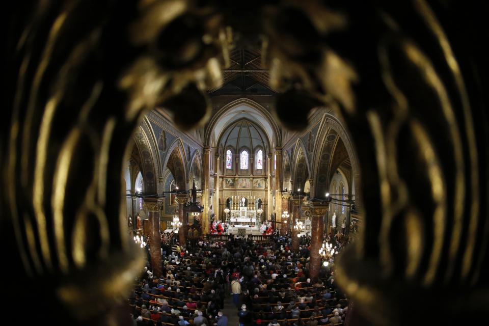 View of interior of St Joseph Cathedral during a Catholic Palm Sunday mass in Bucharest