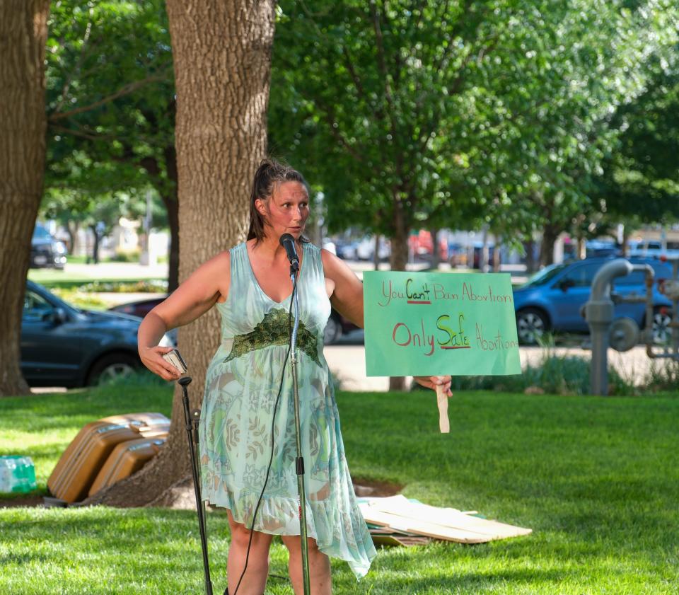 Jami Lyons of the Women's March addresses a rally protesting the repeal of Roe V. Wade on its two year anniversary Monday afternoon at the Potter County Courthouse in Amarillo.