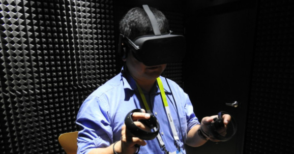 Dean Takahashi using Oculus Rift VR headset with Oculus Touch.