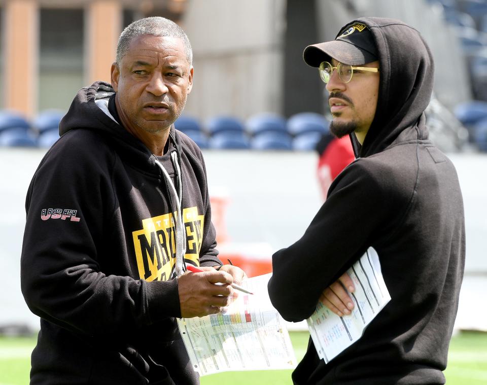 Pittsburgh Maulers head coach Ray Horton, left, with his son, Maulers defensive coordinator Jarren Horton, during practice, Wednesday, June 14, 2023, at Tom Benson Hall of Fame Stadium.