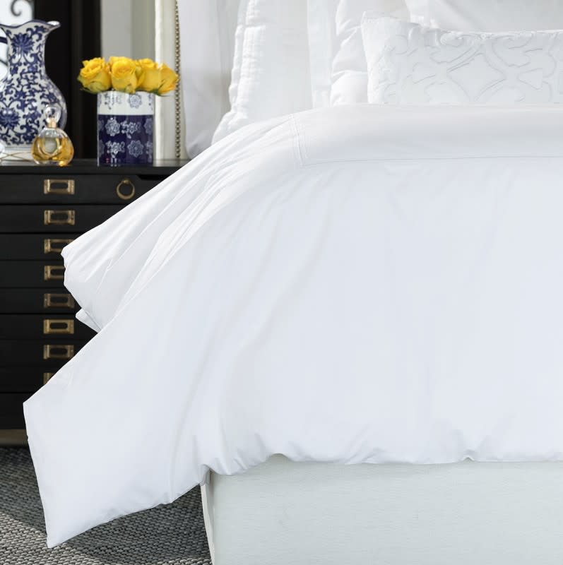 <p>HomeThreads</p><p>Hotel-quality bedding not only adds a touch of luxury but also ensures a restful sleep for your guests. Include a spare set of bed sheets in the room so they're prepared for unexpected accidents without inconvenience.</p><h3><a href="https://clicks.trx-hub.com/xid/arena_0b263_mensjournal?event_type=click&q=https%3A%2F%2Fgo.skimresources.com%2F%3Fid%3D106246X1712071%26url%3Dhttps%3A%2F%2Fwww.homethreads.com%2Fproducts%2Fbedding%2Fbella&p=https%3A%2F%2Fwww.mensjournal.com%2Fpursuits%2Fhome-living%2Fdesign-a-welcoming-guest-bedroom%3Fpartner%3Dyahoo&ContentId=ci02cf8b0e90002444&author=Emily%20Fazio&page_type=Article%20Page&partner=yahoo&section=Bedroom&site_id=cs02b334a3f0002583&mc=www.mensjournal.com" rel="nofollow noopener" target="_blank" data-ylk="slk:Bella Notte Linens - Luxury Bedding Collections;elm:context_link;itc:0;sec:content-canvas" class="link ">Bella Notte Linens - Luxury Bedding Collections</a></h3><ul><li>300TC White Cotton Percale and White Satin Embroidery</li><li>Machine Washable</li></ul><h3><a href="https://clicks.trx-hub.com/xid/arena_0b263_mensjournal?event_type=click&q=https%3A%2F%2Fgo.skimresources.com%2F%3Fid%3D106246X1712071%26url%3Dhttps%3A%2F%2Fwww.featherstitchny.com%2Fshop%2Fp%2Fsheet-set%2F500-tc&p=https%3A%2F%2Fwww.mensjournal.com%2Fpursuits%2Fhome-living%2Fdesign-a-welcoming-guest-bedroom%3Fpartner%3Dyahoo&ContentId=ci02cf8b0e90002444&author=Emily%20Fazio&page_type=Article%20Page&partner=yahoo&section=Bedroom&site_id=cs02b334a3f0002583&mc=www.mensjournal.com" rel="nofollow noopener" target="_blank" data-ylk="slk:Feather & Stitch 500 Thread Count Sheets;elm:context_link;itc:0;sec:content-canvas" class="link ">Feather & Stitch 500 Thread Count Sheets</a></h3><ul><li>Made of 100% OEKO-TEX® certified cotton for softness and comfort<br></li><li>Includes smart tags and 18” deep pockets for easy tucking under the mattress</li></ul><h3><a href="https://clicks.trx-hub.com/xid/arena_0b263_mensjournal?event_type=click&q=https%3A%2F%2Fgo.skimresources.com%2F%3Fid%3D106246X1712071%26url%3Dhttps%3A%2F%2Fwww.pompomathome.com%2Fcollections%2Fblankets-throws%2Fproducts%2Fmontauk-throw-7-colors%3Fvariant%3D40645046468719&p=https%3A%2F%2Fwww.mensjournal.com%2Fpursuits%2Fhome-living%2Fdesign-a-welcoming-guest-bedroom%3Fpartner%3Dyahoo&ContentId=ci02cf8b0e90002444&author=Emily%20Fazio&page_type=Article%20Page&partner=yahoo&section=Bedroom&site_id=cs02b334a3f0002583&mc=www.mensjournal.com" rel="nofollow noopener" target="_blank" data-ylk="slk:Montauk Indigo 18x60 Throw Blanket by Pom Pom at Home;elm:context_link;itc:0;sec:content-canvas" class="link ">Montauk Indigo 18x60 Throw Blanket by Pom Pom at Home</a></h3><ul><li>100% organic linen</li><li>Available in 7 colors</li></ul>