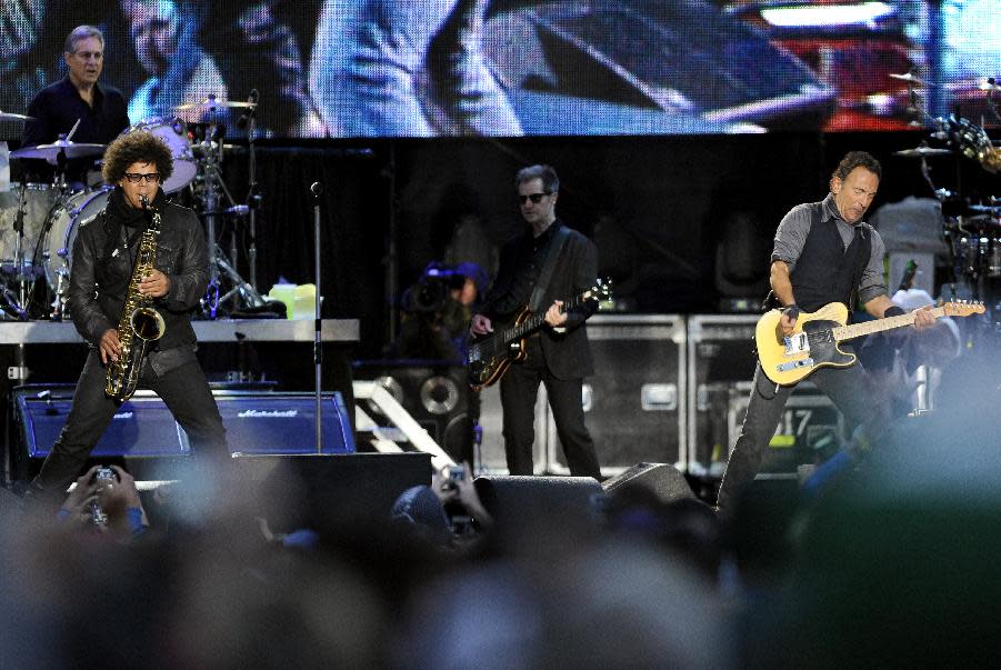 Bruce Springsteen and the E Street Band perform during the 2014 NCAA March Madness Music Festival - Capital One JamFest, Sunday, April 6, 2014, in Dallas. (Photo by Matt Strasen/Invision/AP)