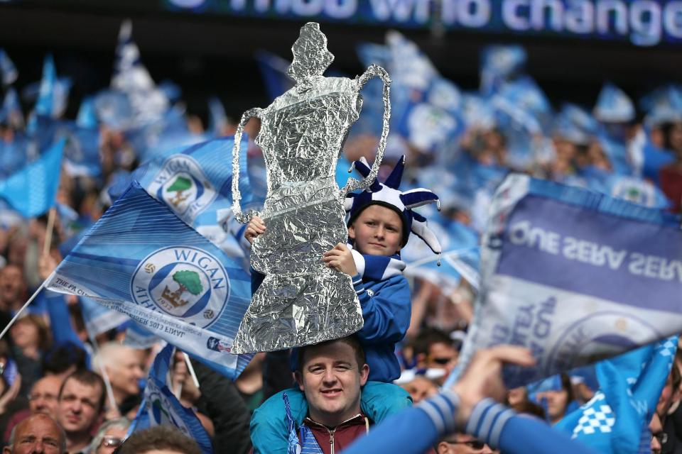 Wigan Athletic fans show their support in the stands