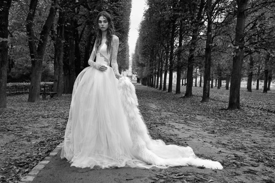 <p><i>Long-sleeve, washed charmeuse halter ball gown with Chantilly lace. (Photo: Courtesy of Vera Wang/Patrick Demarchelier) </i></p>