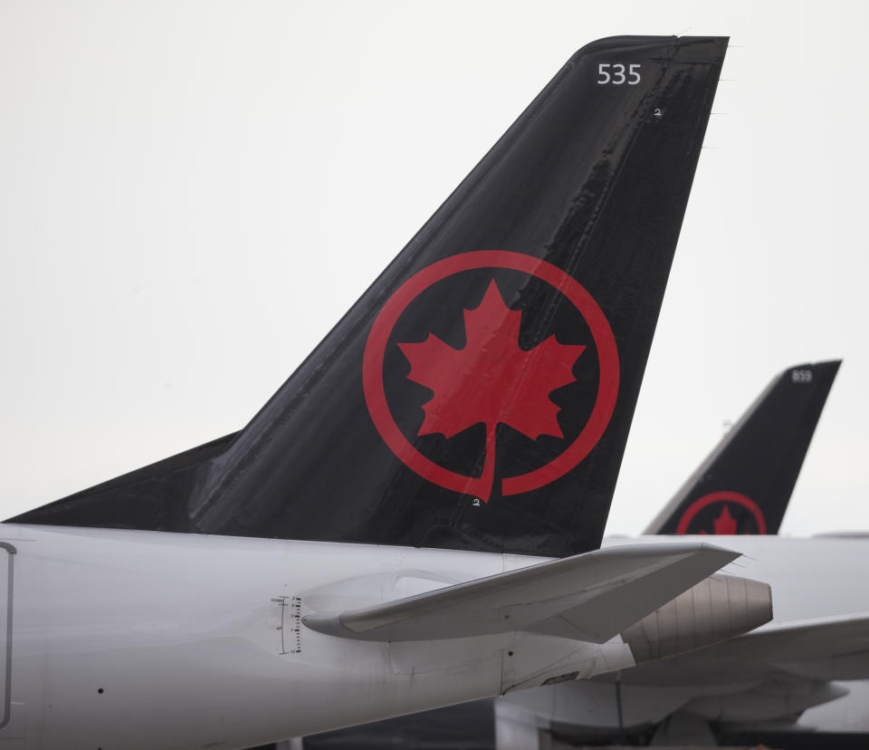 MISSISSAUGA, ON - NOVEMBER 4: Air Canada aircraft parked on the apron at airport. Aircraft at Pearson International Airport. COVID-19 continues to be an issue as vaccinations continue, but at a slower pace than previously. CORONAPD  Toronto Star/Rick Madonik        (Rick Madonik/Toronto Star via Getty Images)