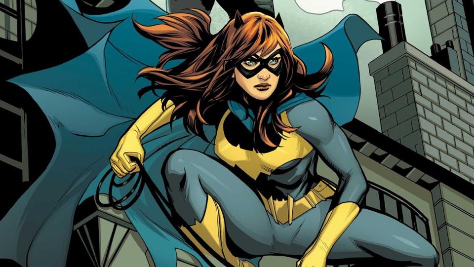Batgirl crouches on a rooftop in an image from the DC Comics series.