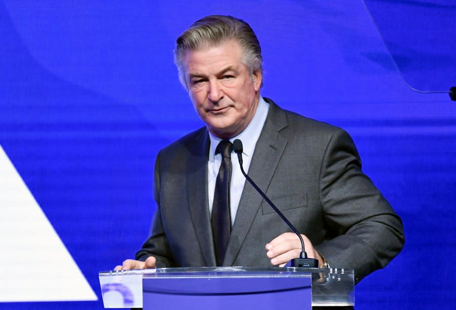 FILE – Alec Baldwin emcee the Robert F. Kennedy Human Rights Ripple of Hope Award Gala at New York Hilton Midtown on Dec. 9, 2021, in New York. A New Mexico judge is considering whether to dismiss a grand jury indictment against actor Alec Baldwin in the fatal shooting on the set of a Western movie, at a scheduled court hearing on Friday. (Photo by Evan Agostini/Invision/AP, File)