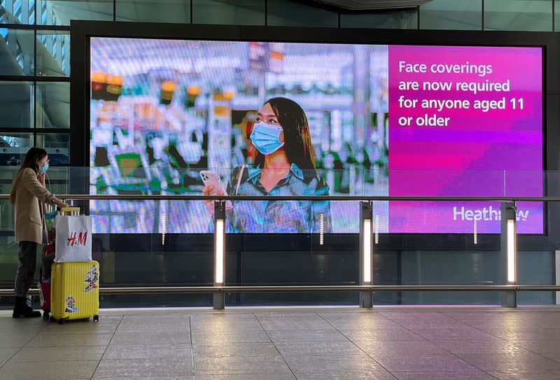 A public health campaign message is seen at Heathrow Airport, following the outbreak of the coronavirus disease (COVID-19), London, Britain