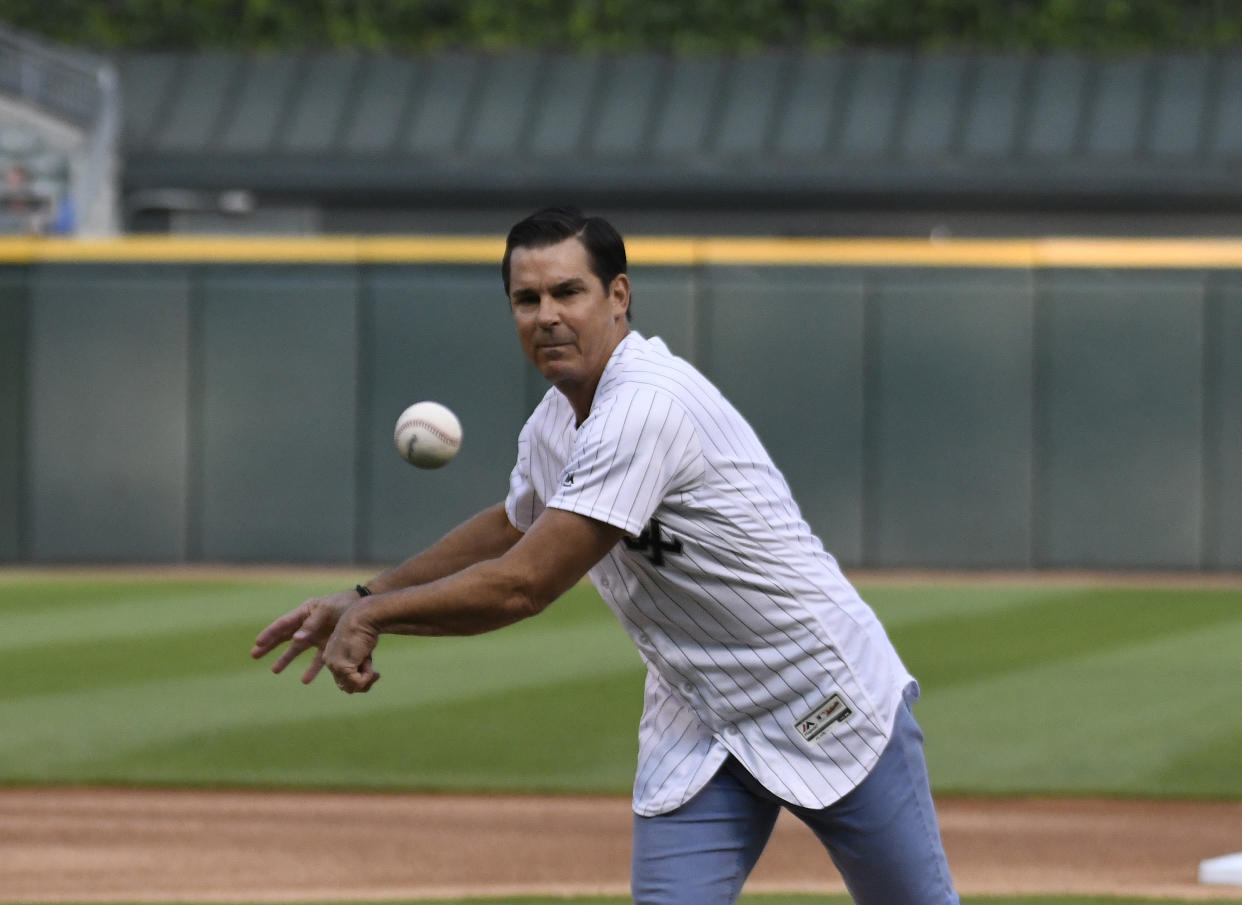 CHICAGO, ILLINOIS - JULY 23: MLB executive Billy Bean throws out a ceremonial first pitch before the game between the Chicago White Sox and the Miami Marlins at Guaranteed Rate Field on July 23, 2019 in Chicago, Illinois. (Photo by David Banks/Getty Images)