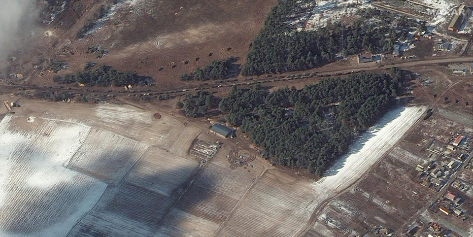 This satellite image provided by Maxar Technologies shows resupply trucks and multiple probable rocket launchers in firing position, in Berestyanka, Ukraine, during the Russian invasion, Wednesday, March 9, 2022. (Satellite image ©2022 Maxar Technologies via AP)