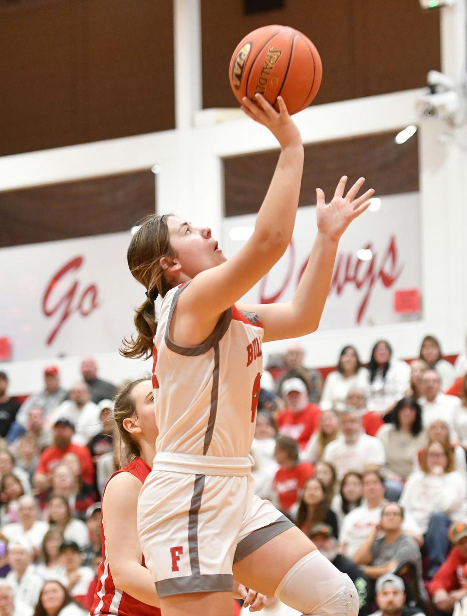 Freedom's Brianne Casto goes in for a layup against Bishop McCort during Friday night's PIAA Class 2A playoff game at Freedom High School.