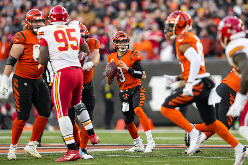 Cincinnati Bengals quarterback Joe Burrow (9) throws against the Kansas City Chiefs in the first half of an NFL football game in Cincinnati, Sunday, Dec. 4, 2022. (AP Photo/Jeff Dean)