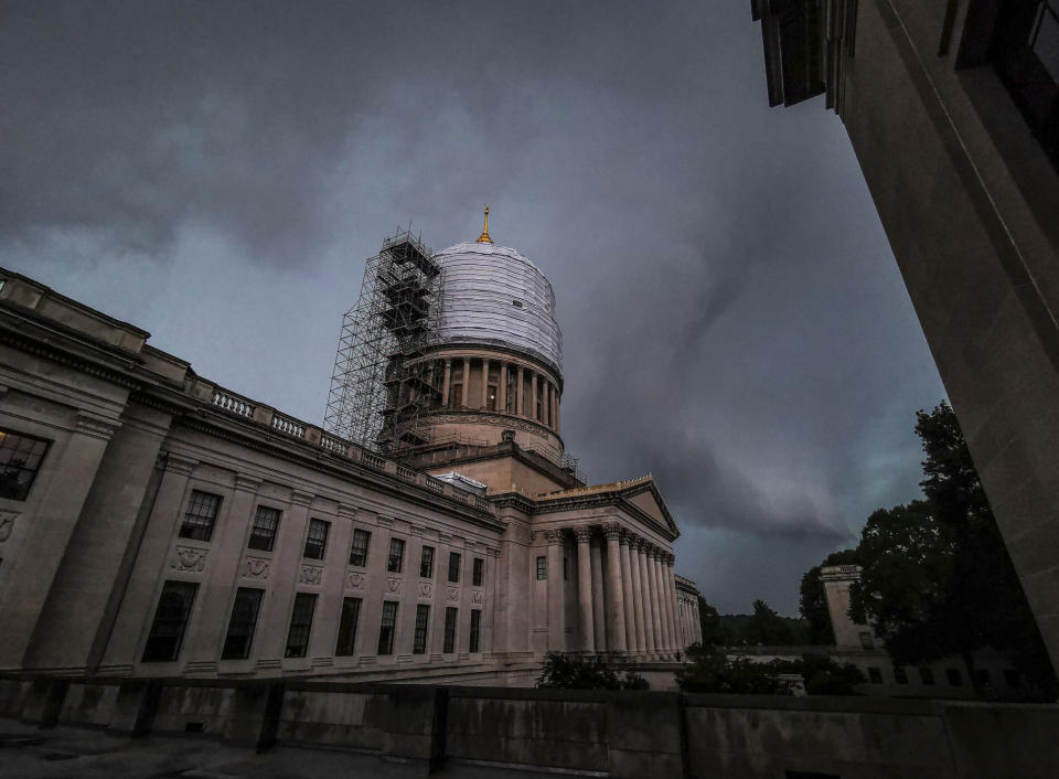 In this Monday, June 24, 2019 photo, storm clouds form over the state Capitol in Charleston, W.Va. (Perry Bennett via AP)