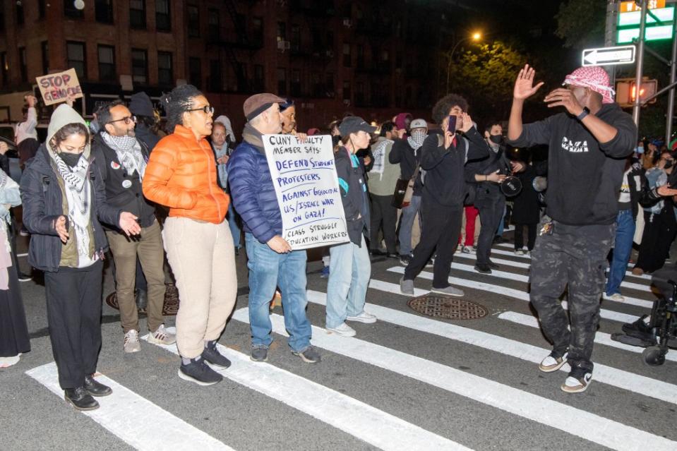 Protesters are seen marching by the City College of New York in West Harlem on April 30, 2024. William Miller