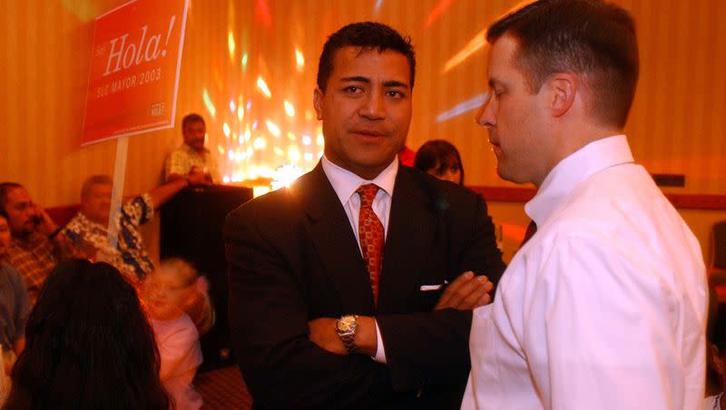 Molonai Hola speaks to supporter during his election night event at the University Park Marriott on Oct. 7, 2003.
