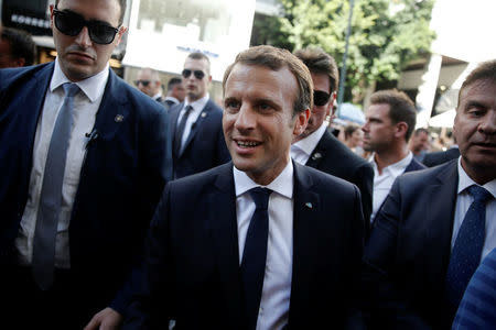 French President Emmanuel Macron greets passers-by on main commercial Ermou Street in Athens, Greece September 8, 2017. REUTERS/Alkis Konstantinidis