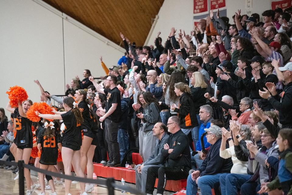 David Prouty fans cheer the Panthers during the Clark Tournament Small Schools final against Hopedale.