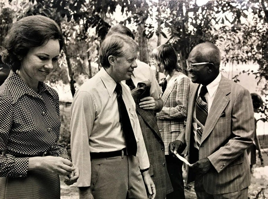 FILE: Georgia Gov. Jimmy Carter, with his wife, Rosalynn, chats with state Rep. R.A. Dent of Augusta during a visit to Augusta in 1973. As governor, Carter played a significant role in advocating for clean water and land protections throughout Georgia.