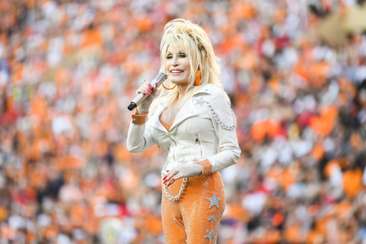 Dolly Parton sings Rocky Top during a football game between Tennessee and Georgia at Neyland Stadium in Knoxville, Tenn., on Saturday, Nov. 18, 2023.