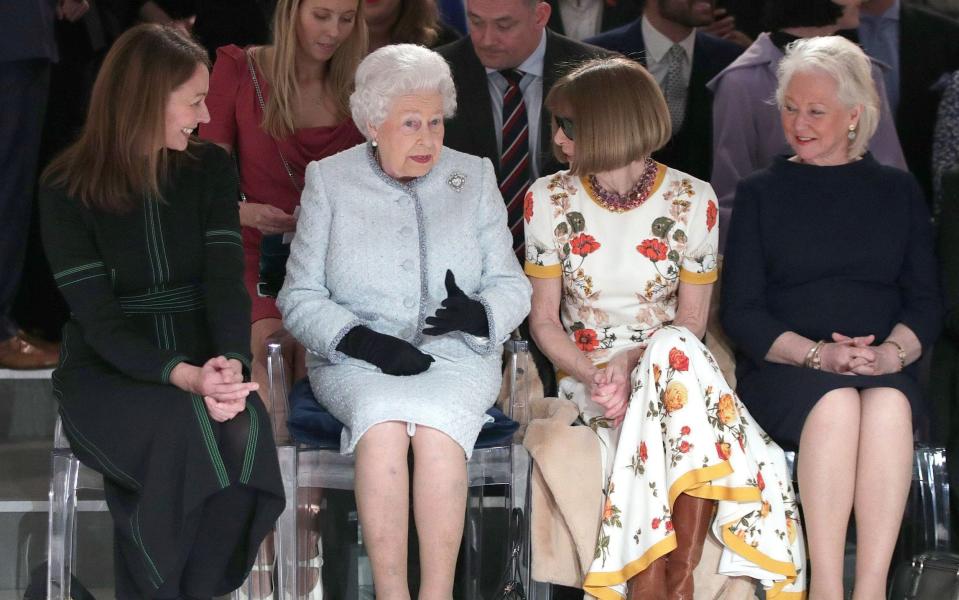 The Queen and Angela Kelly (far right) at London Fashion Week in 2018 -  Yui Mok - Pool/Getty Images