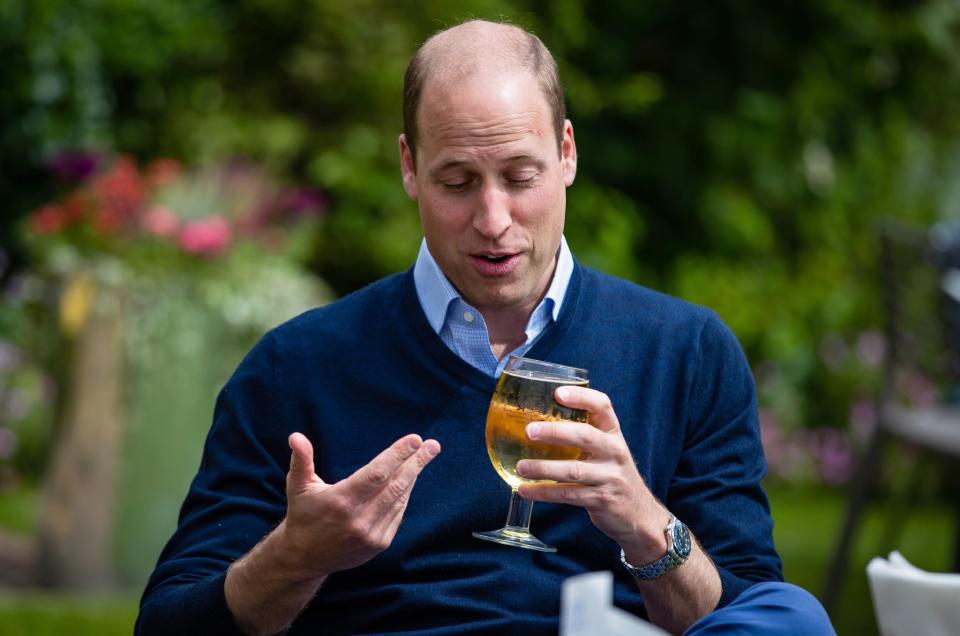 Prince William, Duke of Cambridge takes a sip of an Aspalls cider at The Rose and Crown pub (Getty Images)