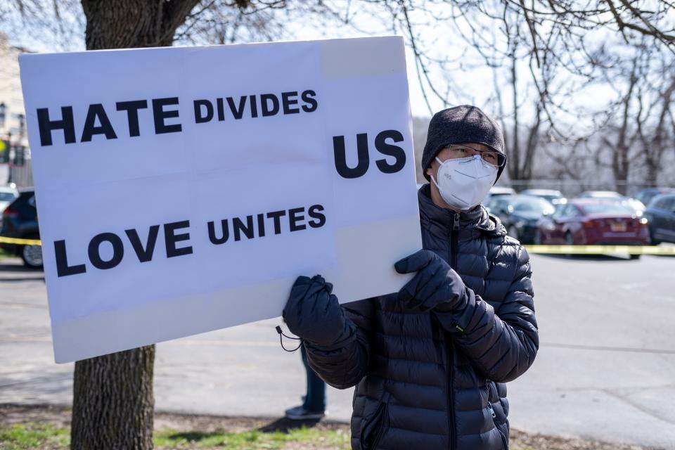 One way to make a difference is to express your solidarity and support for the victims and targets of hate and discrimination. Shown here is a Stop Asian Hate rally in Rochester, New York, on April 3, 2021.