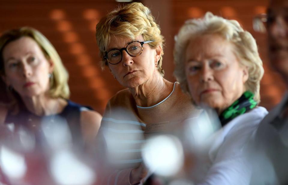 Longboat Key town commissioner Maureen Merrigan, center, during a roundtable discussion on increased levels of red tide in the Southwest Florida at the Beach House Restaurant in Bradenton Beach Friday.